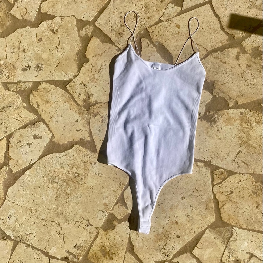 Brand new White bodysuit